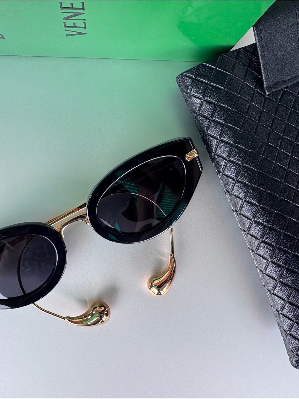 Bottega Veneta Black Cat-Eye Sunglasses with Gold Temples